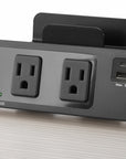 Picture of the SitOnIt Current Clamp mount 3 Outlet & 2 USB Power Hub in Black mounted to a top. Kansas City Office Furniture