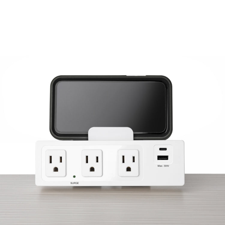 SitOnIt Current Multi-outlet strip with USB ports and a smartphone on a white background. Kansas City Office Design.