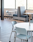 Modern office or meeting area with tables and chairs. Kansas City Office Design