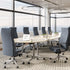 Modern conference room with gray Prava conference chairs and a large table. Kansas City Office Design