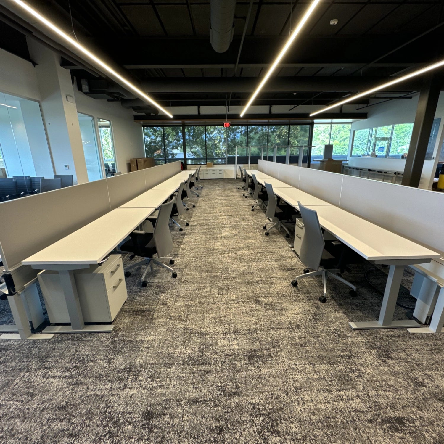 Height Adjustable Benching Stations with mobile pedestal and chairs. AIS & SitonIt furniture. Kansas City Office Design.