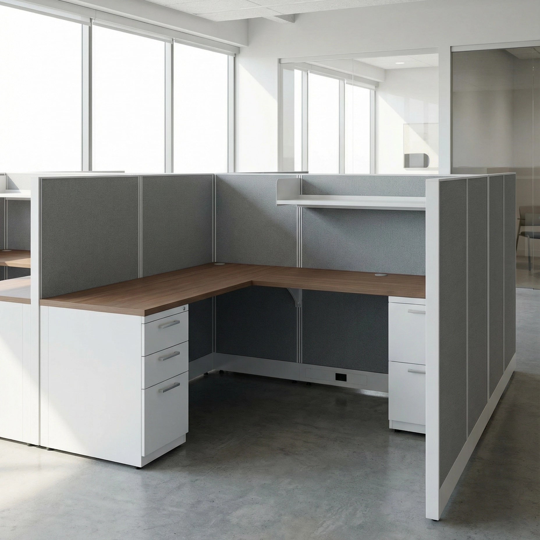 Modern office desk with partition walls in a bright room. Kansas City Office Design