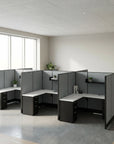 Modern office cubicles with gray partitions in a bright room. Kansas City Office Design