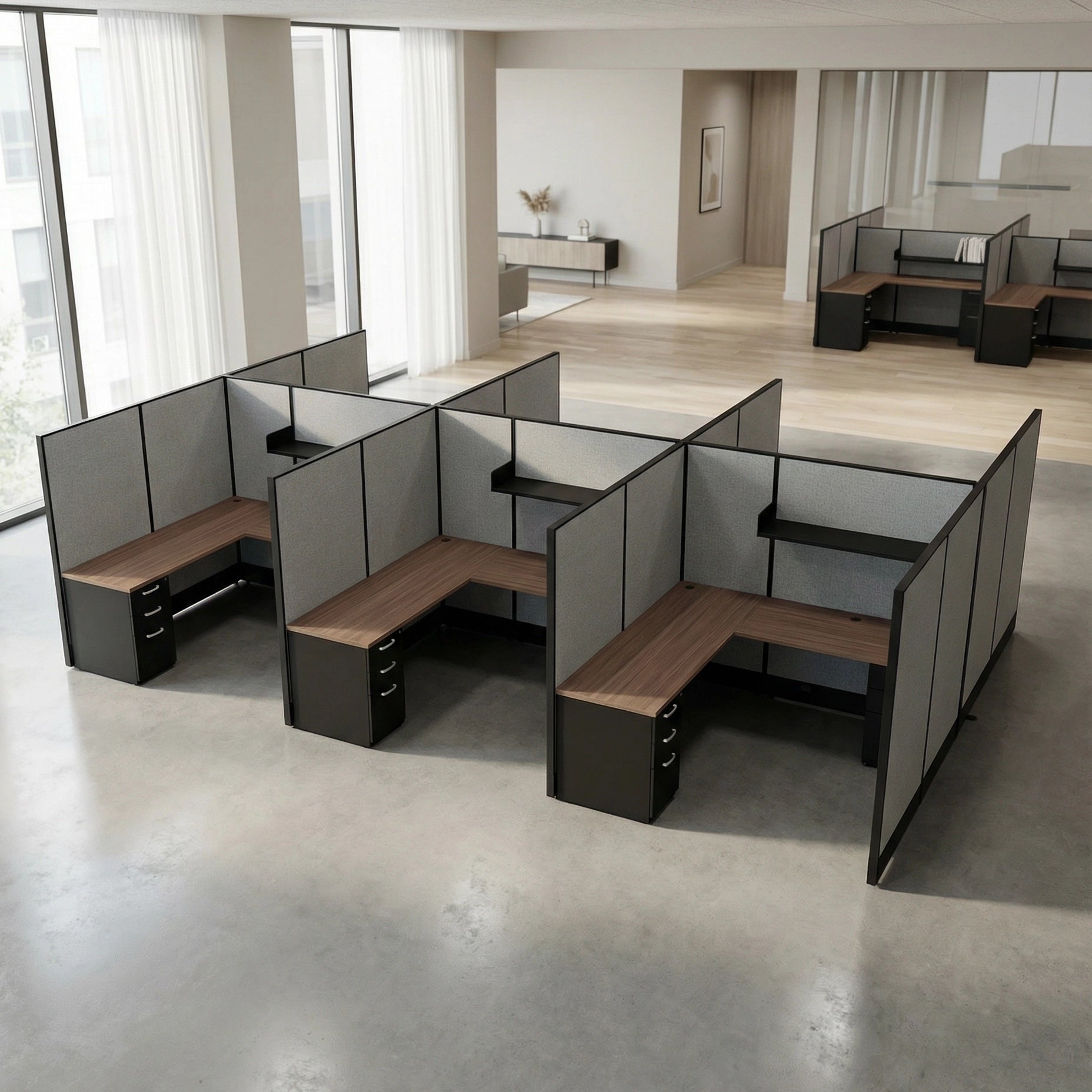 Modern office cubicles with gray partitions and wooden desks in a bright room. Kansas City Office Design