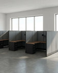 Modern office cubicles with glass partitions in a bright room. Kansas City Office Design
