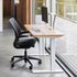 HumanScale eFloat Go 2.0 Sit-Stand Height Adjustable Desk in work from home office with natural light. Natural laminate top. White base. Kansas City office furniture.