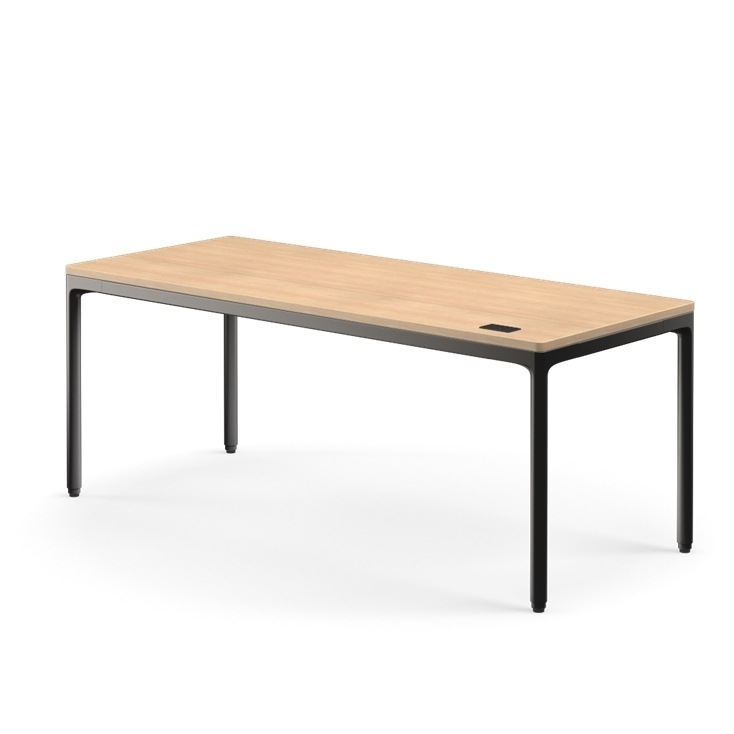 Side view of the Humanscale eFloat Quattro height adjustable 29"x70" desk with black base and Rift Oak top. Kansas City Office Design.