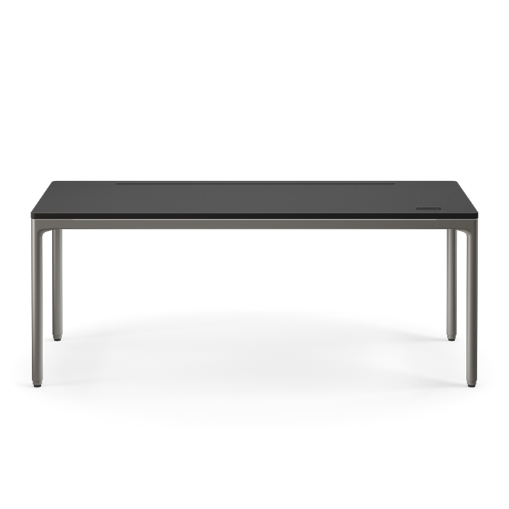 Front view of the Humanscale eFloat Quattro height adjustable 29"x70" desk with gray base and black top. Kansas City Office Design.