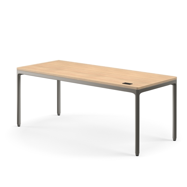 Side view of the Humanscale eFloat Quattro height adjustable 29"x70" desk with gray base and Rift Oak top. Kansas City Office Design.