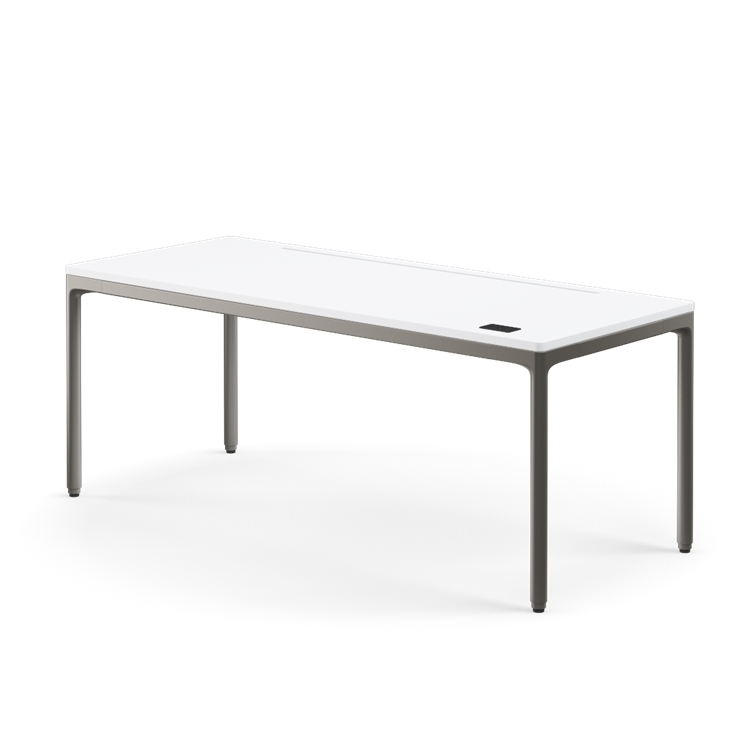 Side view of the Humanscale eFloat Quattro height adjustable 29"x70" desk with gray base and white top. Kansas City Office Design.