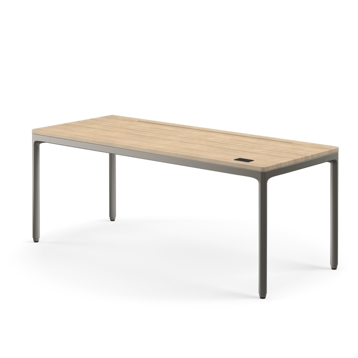 Side view of the Humanscale eFloat Quattro height adjustable 29"x70" desk with gray base and white oak top. Kansas City Office Design.