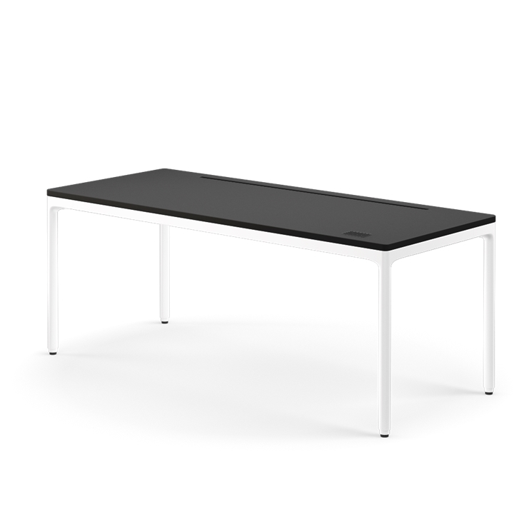 Side view of the Humanscale eFloat Quattro height adjustable 29"x70" desk with white base and black top. Kansas City Office Design.