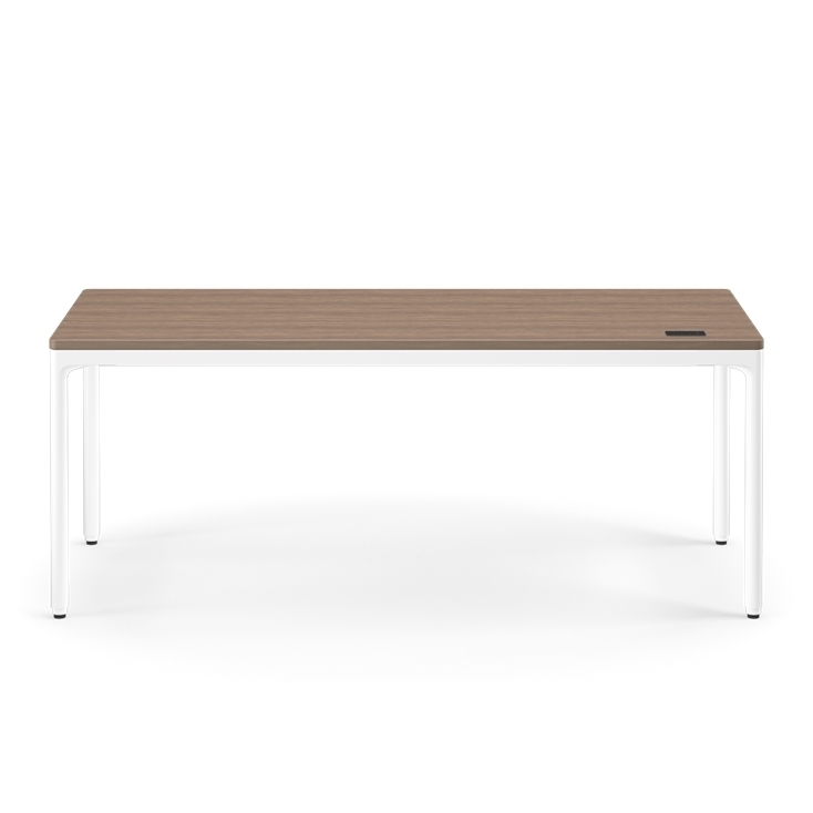 Front view of the Humanscale eFloat Quattro height adjustable 29"x70" desk with white base and walnut top. Kansas City Office Design.