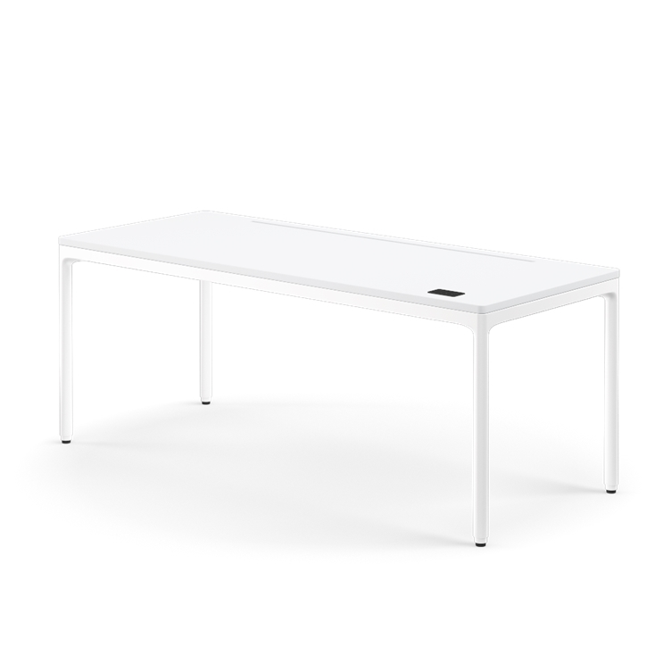 Side view of the Humanscale eFloat Quattro height adjustable 29"x70" desk with white base and white top. Kansas City Office Design.