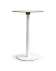 Humanscale Float Gather 30" Round Table in white Base with white oak veneer Top in standing position. Kansas City Office Design.