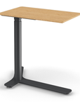 Angled View of the Humanscale Mini Float Height Adjustable Table. Bamboo Top with Black Base. Kansas City Office Furniture