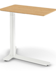 Angled View of the Humanscale Mini Float Height Adjustable Table. Bamboo Top with White Base. Kansas City Office Furniture