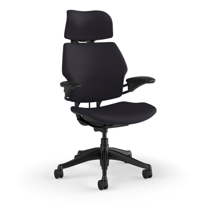 Side view of the HumanScale Freedom with Headrest in a black fabric with black frame. Kansas City Office Furniture.
