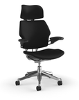Side view of the HumanScale Freedom with Headrest in a black polyurethane fabric with polished aluminum frame. Kansas City Office Furniture.