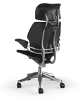 Back view of the HumanScale Freedom with Headrest in a white polyurethane fabric with black frame. Kansas City Office Furniture.