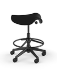 Side view of a Humanscale Saddle Stool with 20" stool ring, wipeable lotus black fabric saddle seat and graphite frame. Kansas City Office Design.