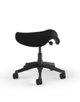 Side view of a Humanscale Saddle Stool with 5" standard cylinder, wipeable lotus black fabric saddle seat and graphite frame. Kansas City Office Design.