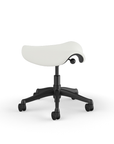 Side view of a Humanscale Saddle Stool with 5" standard cylinder, wipeable lotus white fabric saddle seat and graphite frame. Kansas City Office Design.