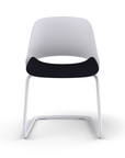 Front view of a Humanscale Trea Chair with cantilever guest chair with glides. In white finish with a black fabric padded seat. Kansas City Office Furniture. 