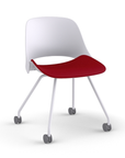 Side view of a Humanscale Trea Chair with four leg guest chair with casters. In white finish with a Parma Red fabric padded seat. Kansas City Office Furniture. 