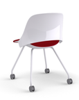 Back view of a Humanscale Trea Chair with four leg guest chair with casters. In white finish with a Parma Red fabric padded seat. Kansas City Office Furniture. 