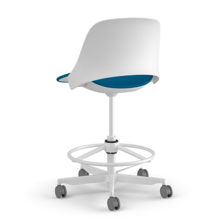 Back view of a Humanscale Trea Chair with stool base and casters. In white finish with a peacock fabric padded seat. Kansas City Office Furniture. 