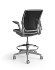 Humanscale World LM mesh back counter-height stool in black seat and gray frame, three-quarter view