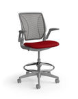 Humanscale World Stool with black mesh, gray frame, Parma Red fabric seat, side view. Kansas City Office Design