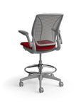 Humanscale World Stool with black mesh, gray frame, Parma Red fabric seat, back view. Kansas City Office Design