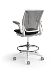 Humanscale World Stool with black mesh, white frame, black polyurethane lotus fabric seat, back view. Kansas City Office Design