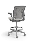 Humanscale World Stool with black mesh, gray frame, white polyurethane lotus fabric seat, back view. Kansas City Office Design
