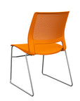 Back view of a SitOnIt Lumin sled base Stack Chair in orange color with chrome frame. Kansas City Office Design.