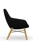 Side view of the 9to5 Lilly lounge chair in maple wood leg frame and black Fabric. Kansas City Office Design