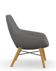 Side view of the 9to5 Lilly lounge chair in maple wood leg frame and gray Fabric. Kansas City Office Design