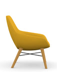 Side view of the 9to5 Lilly lounge chair in maple wood leg frame and yellow Fabric. Kansas City Office Design