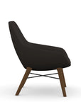 Side view of the 9to5 Lilly lounge chair in walnut wood leg frame and black vinyl Fabric. Kansas City Office Design