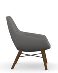 Side view of the 9to5 Lilly lounge chair in walnut wood leg frame and gray Fabric. Kansas City Office Design