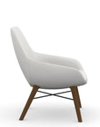 Side view of the 9to5 Lilly lounge chair in walnut wood leg frame and tinsel vinyl Fabric. Kansas City Office Design