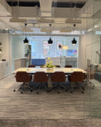 Modern office conference room with a long table and chairs. Kansas City Office Design.