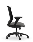 Side view of the 9to5 NeoLite Task chair in a black frame and gray fabric. Kansas City Office Design.