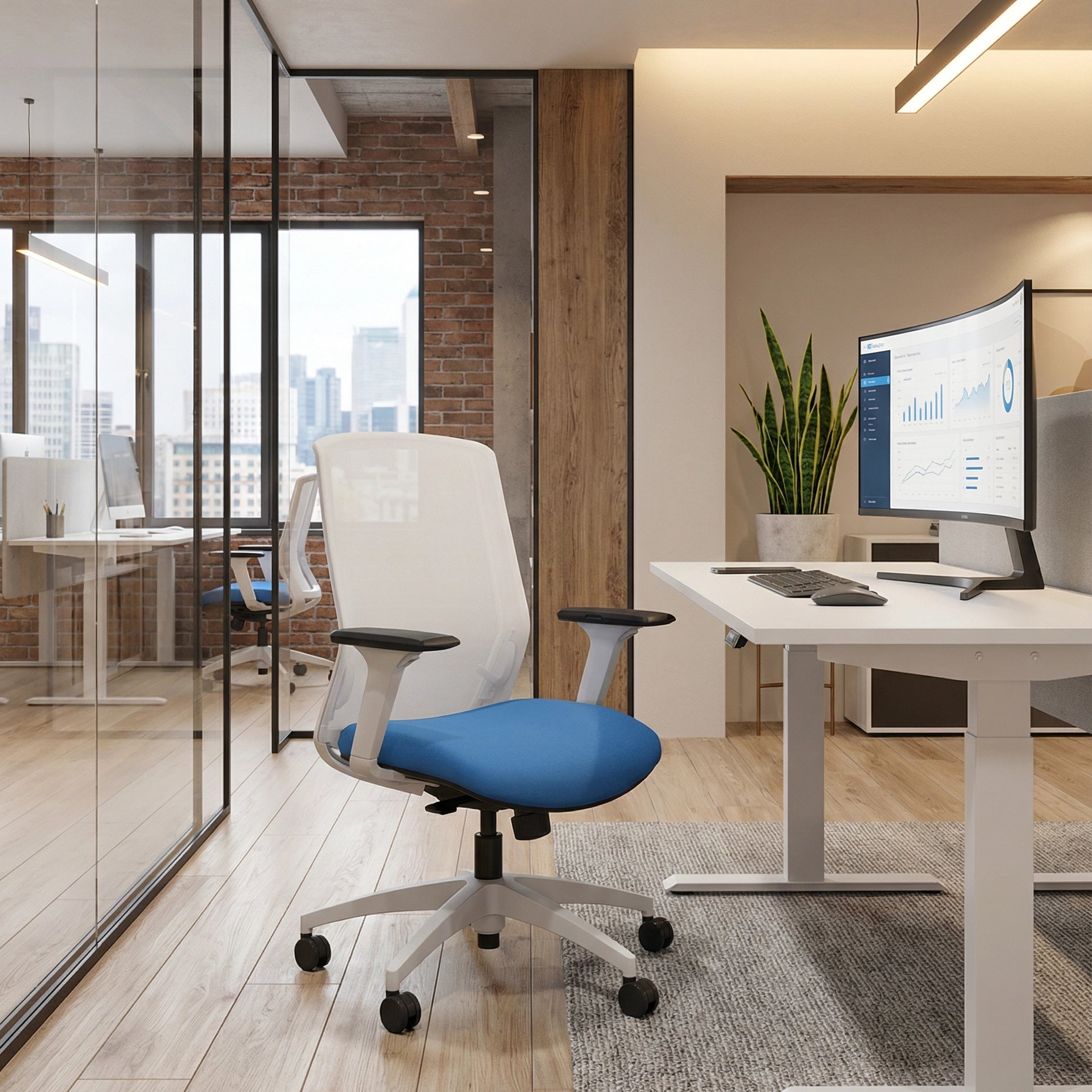 NeoLite Task Chair in a working environment with a height adjustable desk and glass walls. Kansas City Office Design.