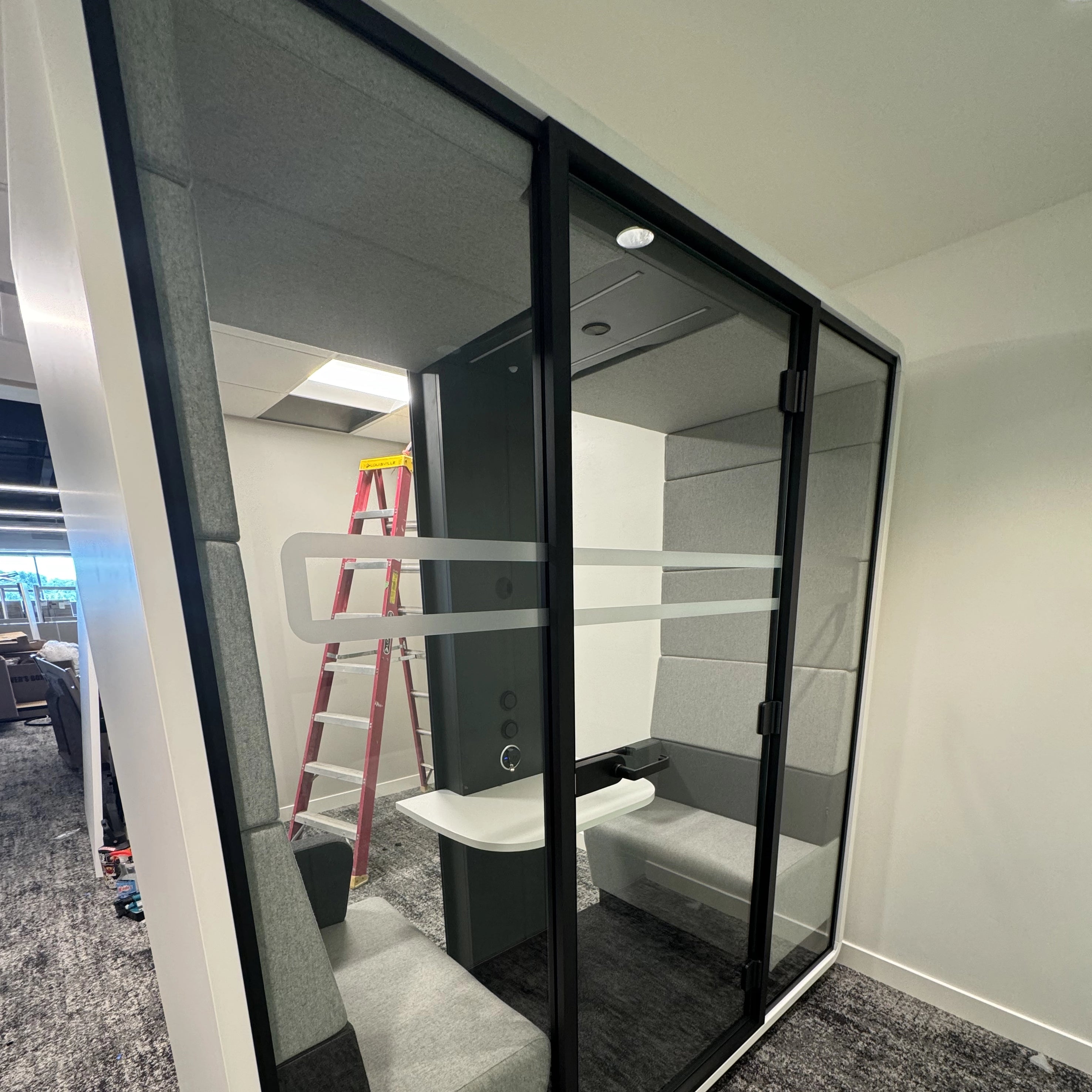 Install of ThinkSpace phone booth. Kansas City Office Design.