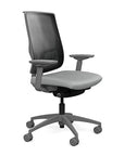 Side view of the Highback SitonIt Focus 2.0 Ergonomic Desk Chair in a black mesh, fog frame, platinum vinyl fabric seat. Kansas City Office Design