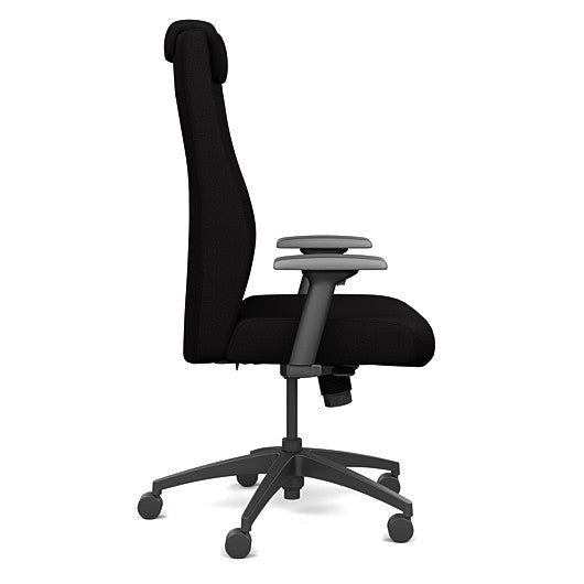 Side view of the SitOnIt Prava highback chair with a headrest in black frame and black fabric. Kansas City Office Design