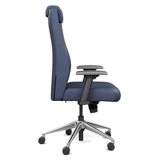 Side view of the SitOnIt Prava highback chair with a headrest in brushed aluminum frame and Sapphire Vinyl fabric. Kansas City Office Design